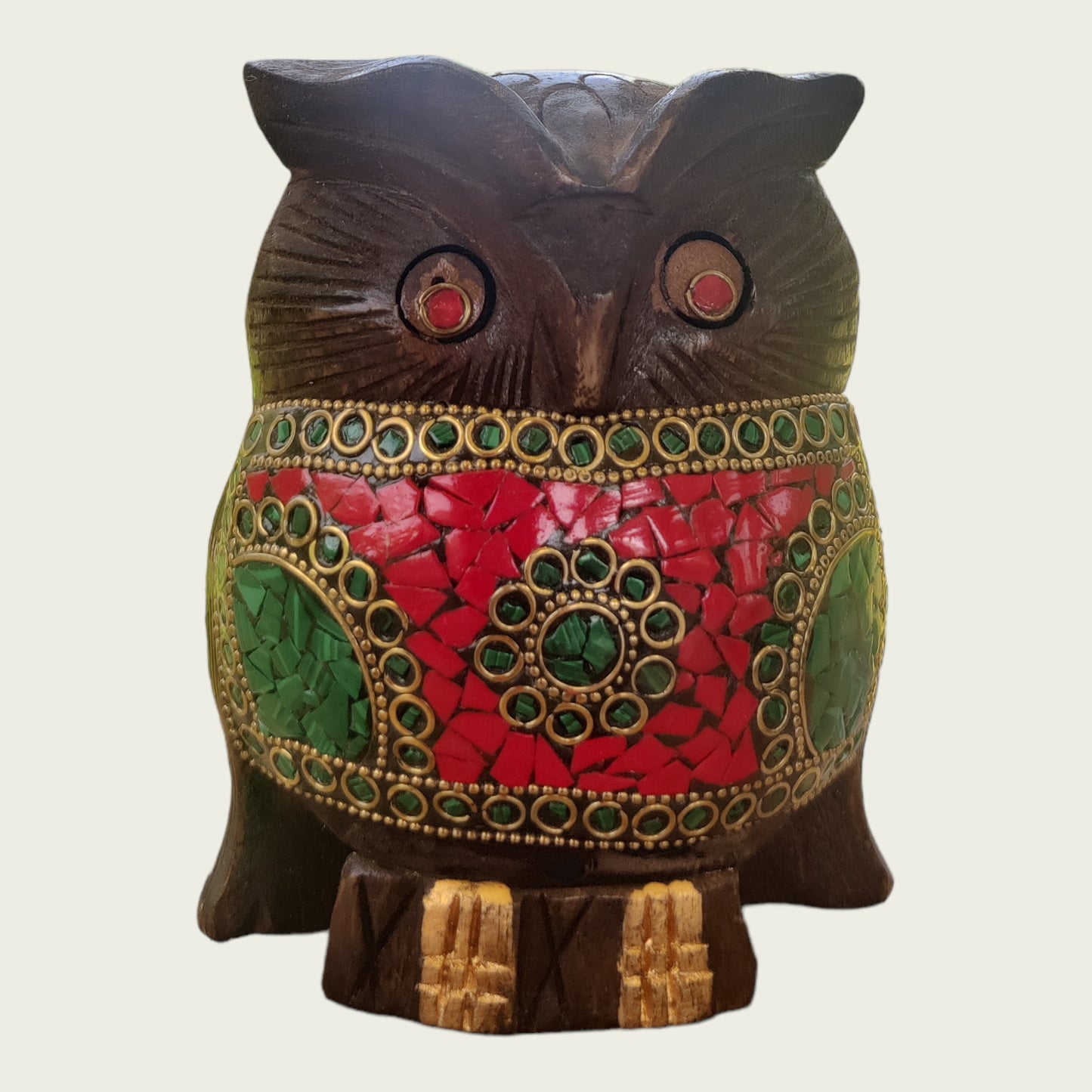 Wooden owl with stone work