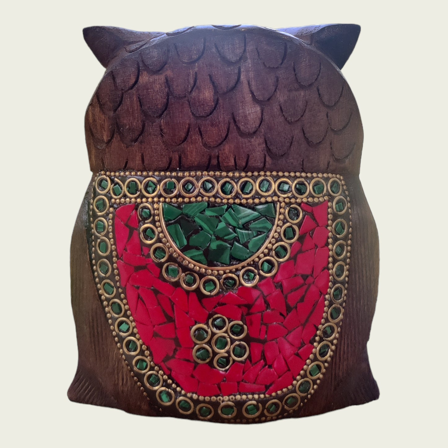 Wooden owl with stone work