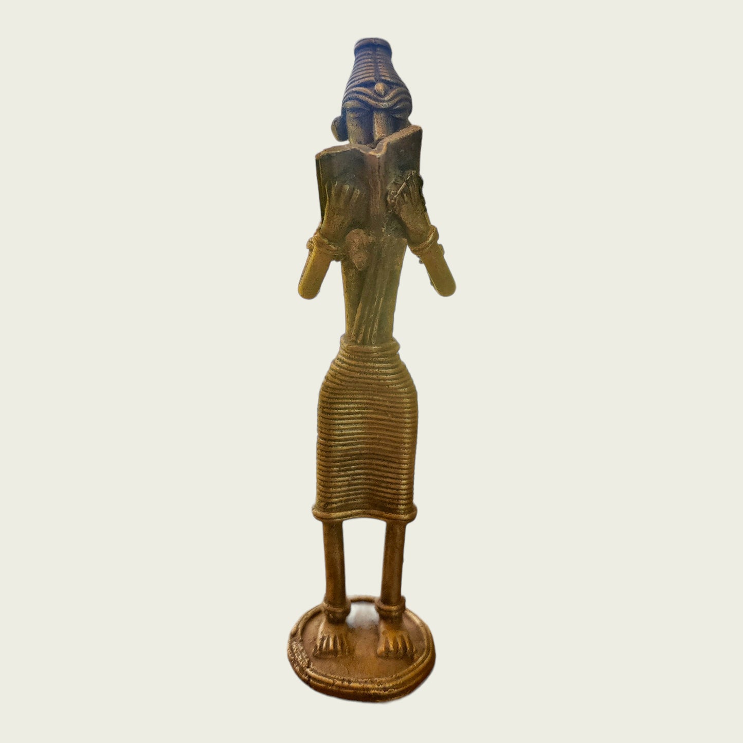 Tribal book reading figure