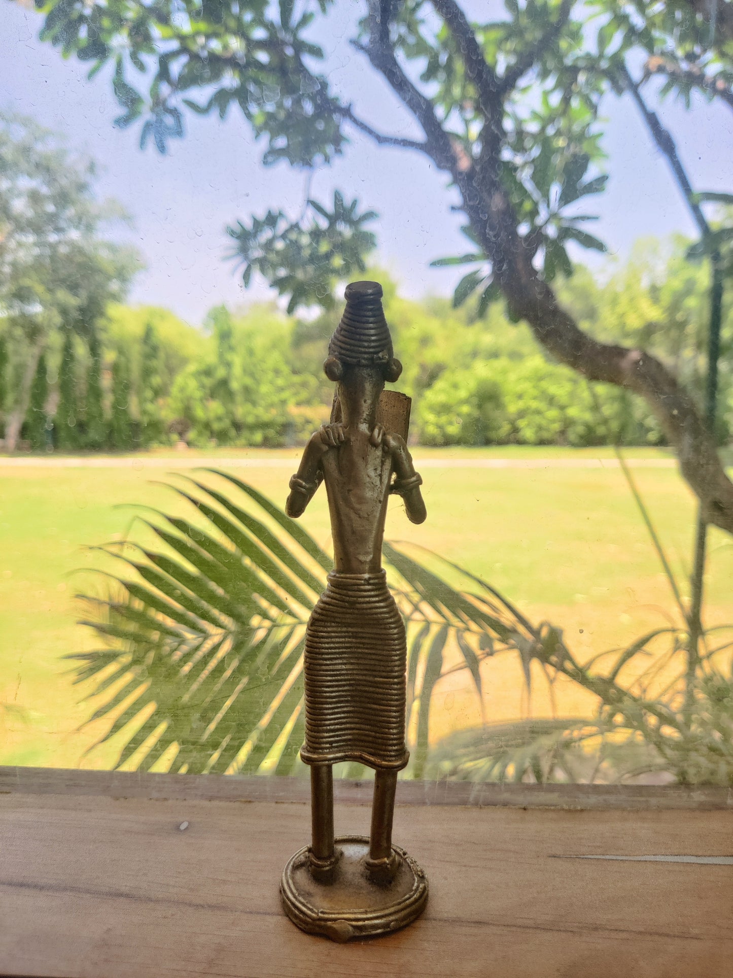 Tribal book reading figure