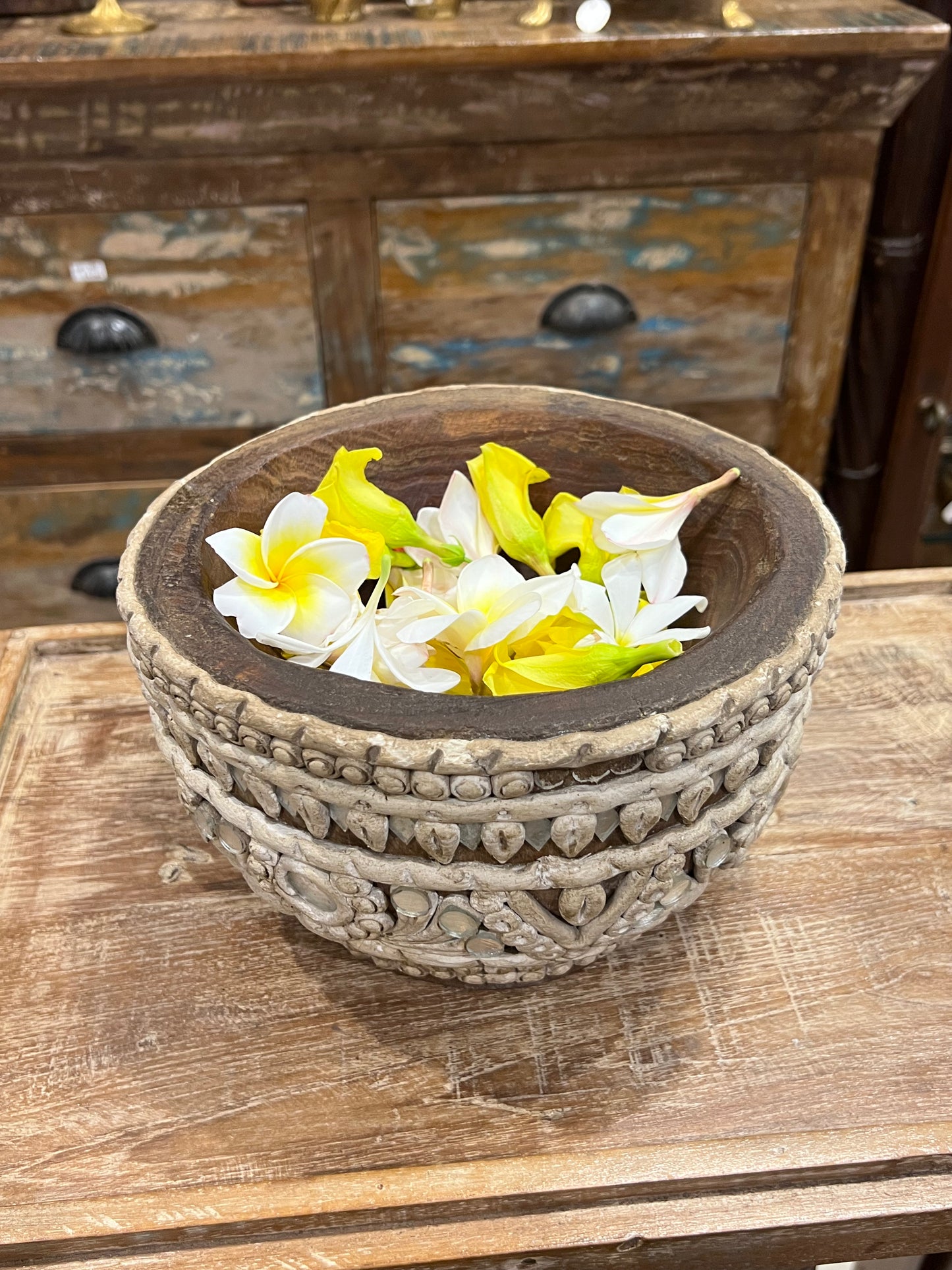 Image of Elegant and Traditional Wooden Bowl with Clay Work. The Source India is an Indian Handicraft, Home Decor, Furnishing and Textiles Store. Based out of Hauz Khas Village New Delhi, each piece is carefully procured to allow the enhancement of India's Culture.