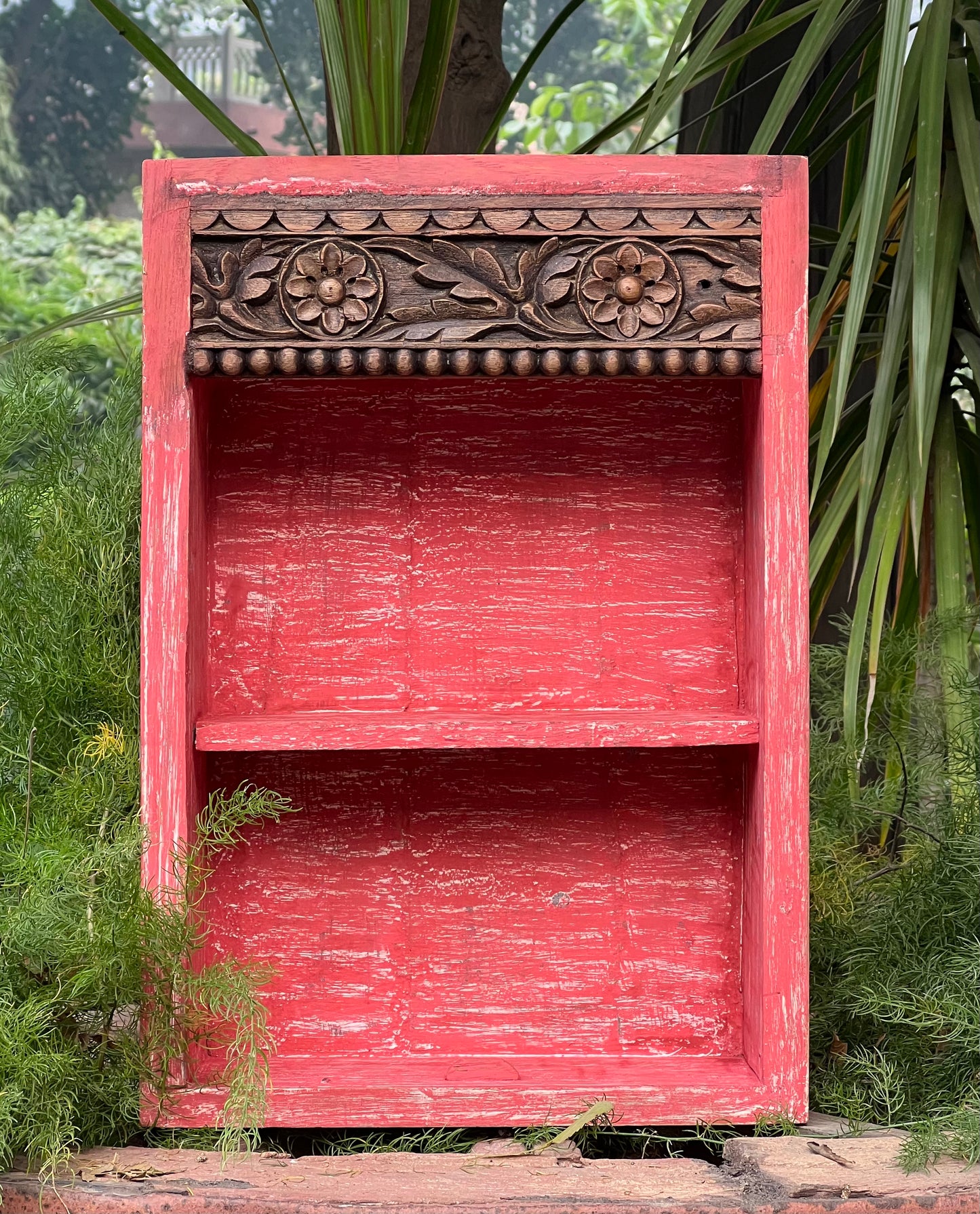Image of Elegant and Traditional Pink Finish Wall Shelf The Source India is an Indian Handicraft, Home Decor, Furnishing and Textiles Store. Based out of Hauz Khas Village New Delhi, each piece is carefully procured to allow the enhancement of India's Culture.