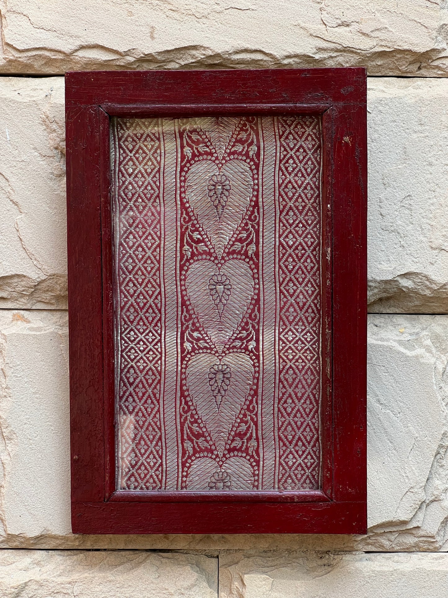 Image of Traditional and Elegant Red Frame with Old Banarasi Patch. The Source India is an Indian Handicraft, Home Decor, Furnishing and Textiles Store. Based out of Hauz Khas Village New Delhi, each piece is carefully procured to allow the enhancement of India's Culture.