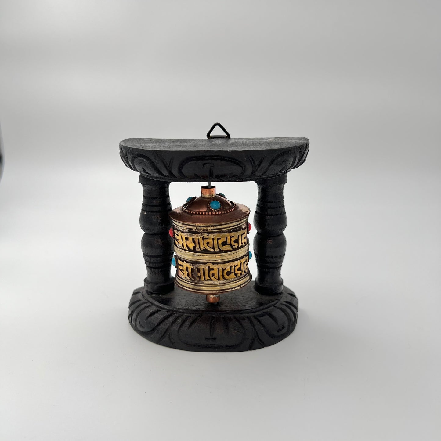 Image of Tibetan Praying Wheel. The Source India is an Indian Handicraft, Home Decor, Furnishing and Textiles Store. Based out of Hauz Khas Village New Delhi, each piece is carefully procured to allow the enhancement of India's Culture.