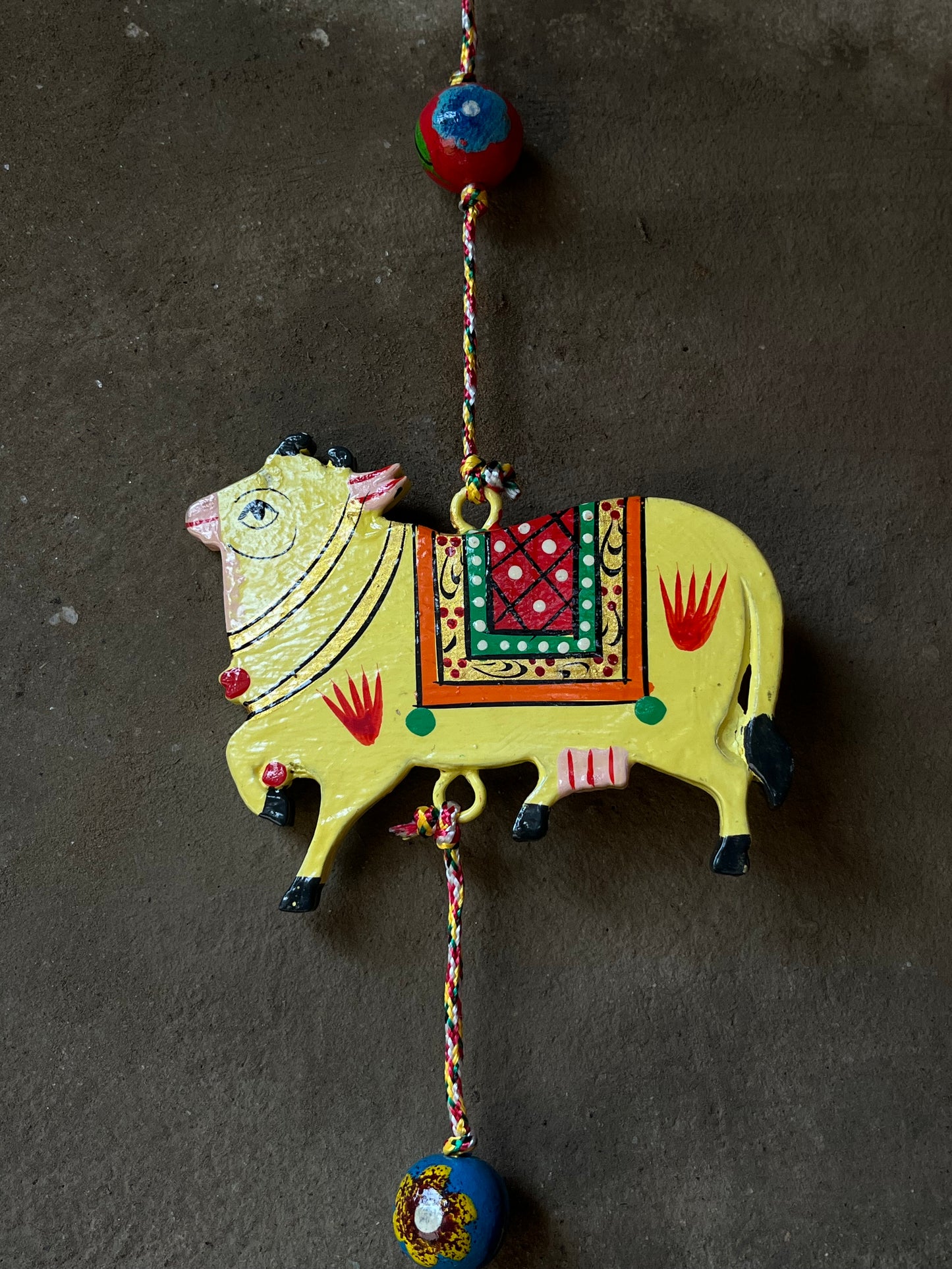 Cow Hanging With Bell