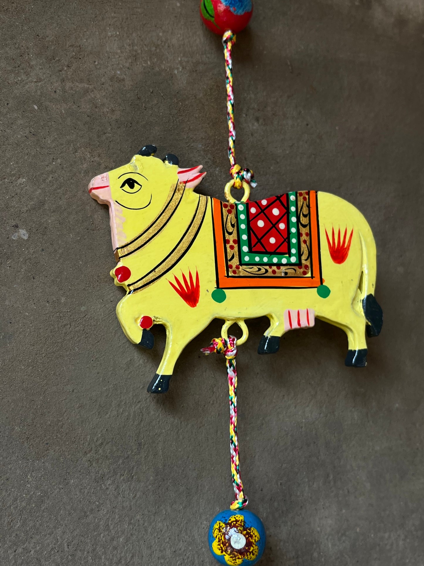 Cow Hanging With Bell