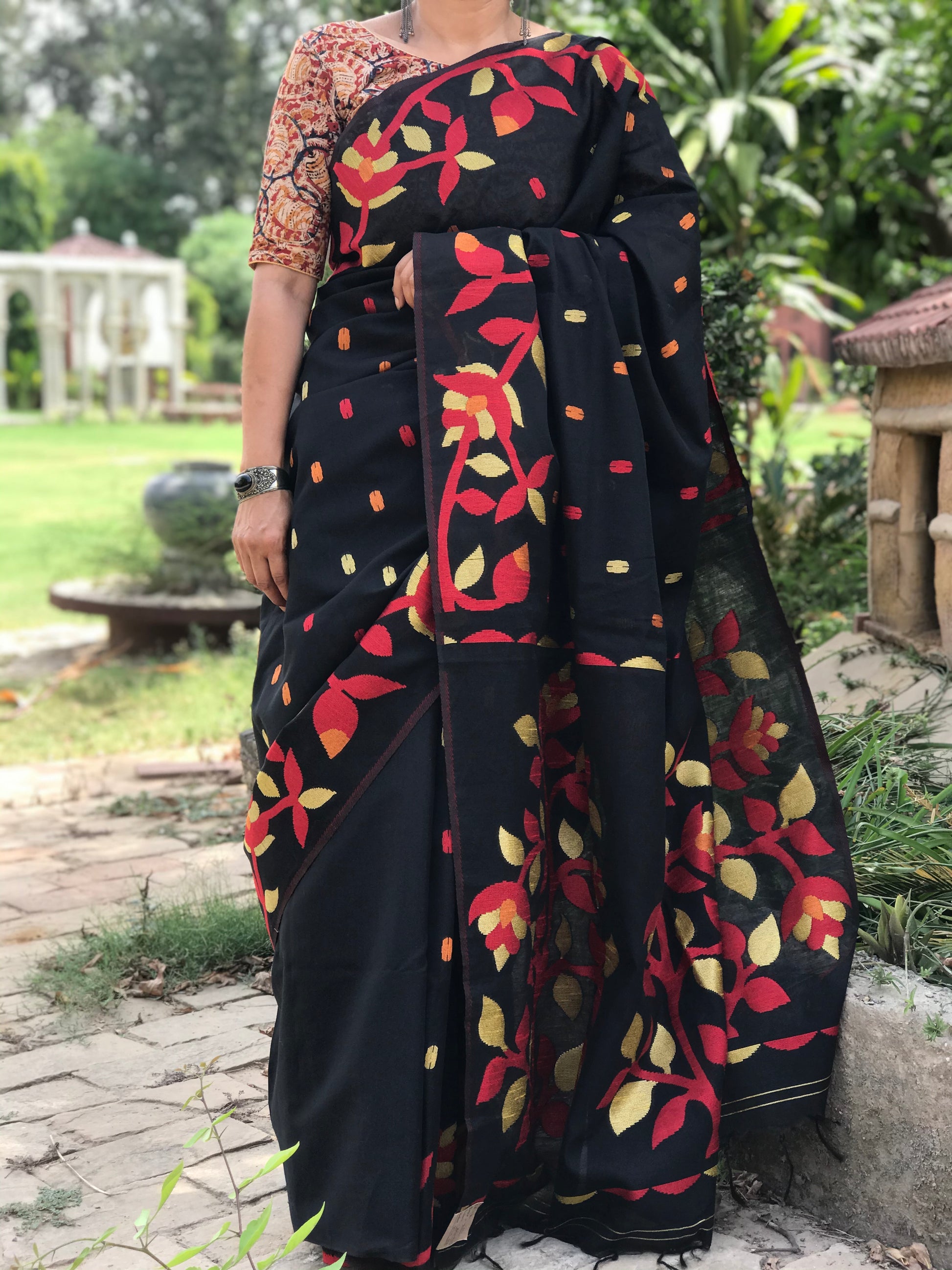 Image of Elegant and Traditional Bengal Cotton Printed Saree  The Source India is an Indian Handicraft, Home Decor, Furnishing and Textiles Store. Based out of Hauz Khas Village New Delhi, each piece is carefully procured to allow the enhancement of India's Culture. 