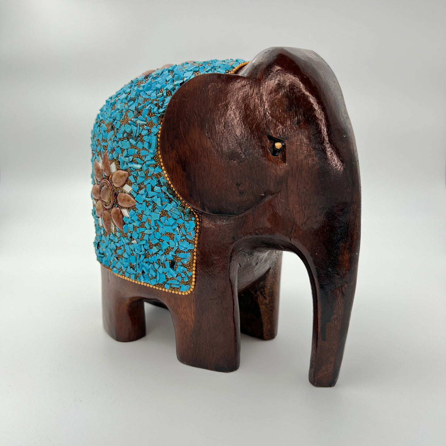 Image of Wooden Elephant with Turquoise Stone Work.  The Source India is an Indian Handicraft, Home Decor, Furnishing and Textiles Store. Our Mission is to allow the enhancement of India's Culture
