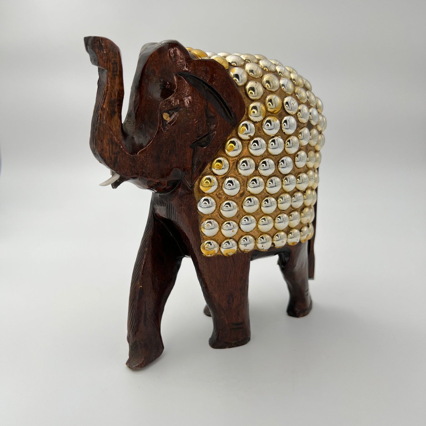 Image of Wooden Elephant with Gold Beads Work.  The Source India is an Indian Handicraft, Home Decor, Furnishing and Textiles Store. Our Mission is to allow the enhancement of India's Culture