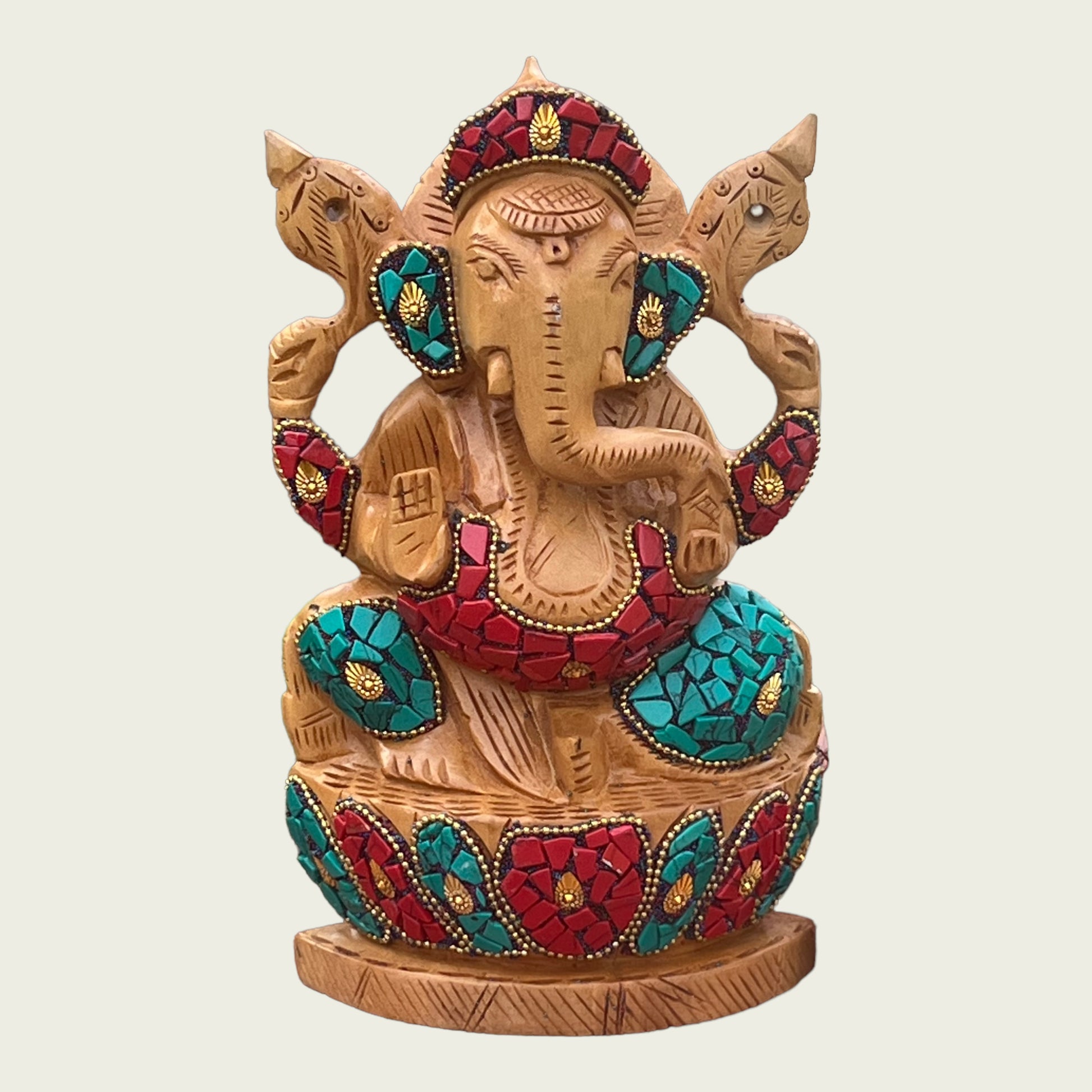 Image of Wooden Ganesha With Stone Work  The Source India is an Indian Handicraft, Home Decor, Furnishing and Textiles Store. Based out of Hauz Khas Village New Delhi, each piece is carefully procured to allow the enhancement of India's Culture.