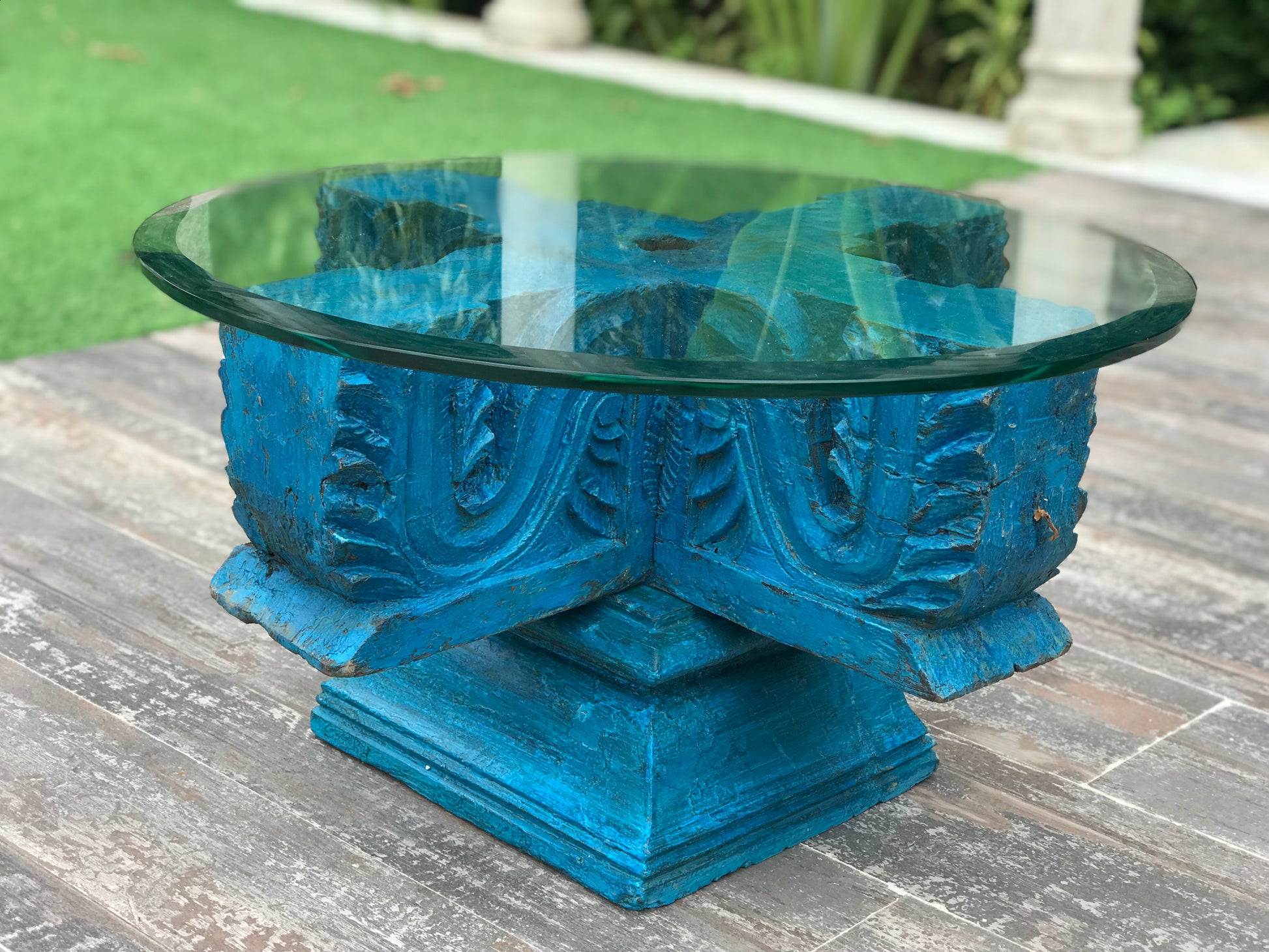 Elegant and Traditional Wooden Carved Blue Bracket Coffee Table.  The Source India is an Indian Handicraft, Home Decor, Furnishing and Textiles Store. Based out of Hauz Khas Village New Delhi, each piece is carefully procured to allow the enhancement of India's Culture.