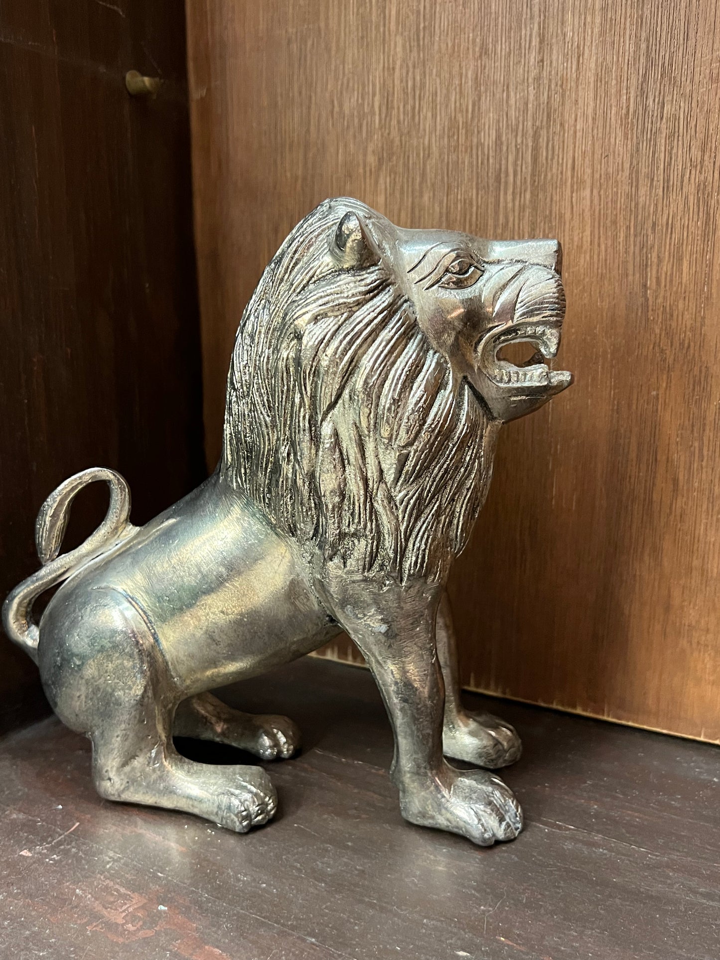 Image of Metal Lion  The Source India is an Indian Handicraft, Home Decor, Furnishing and Textiles Store. Our Mission is to allow the enhancement of India's Culture