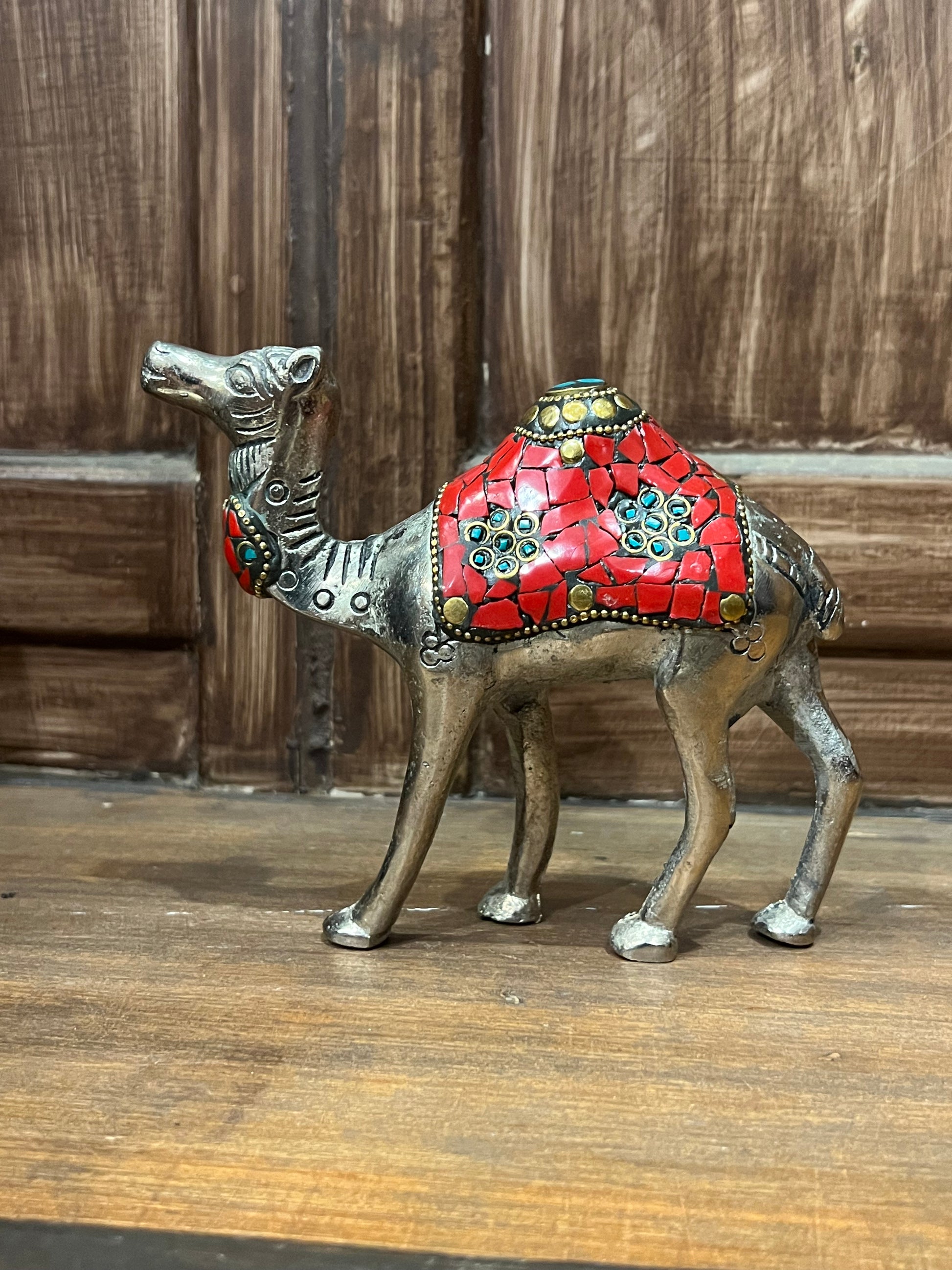 Image of Metal Camel with Stone Work  The Source India is an Indian Handicraft, Home Decor, Furnishing and Textiles Store. Our Mission is to allow the enhancement of India's Culture