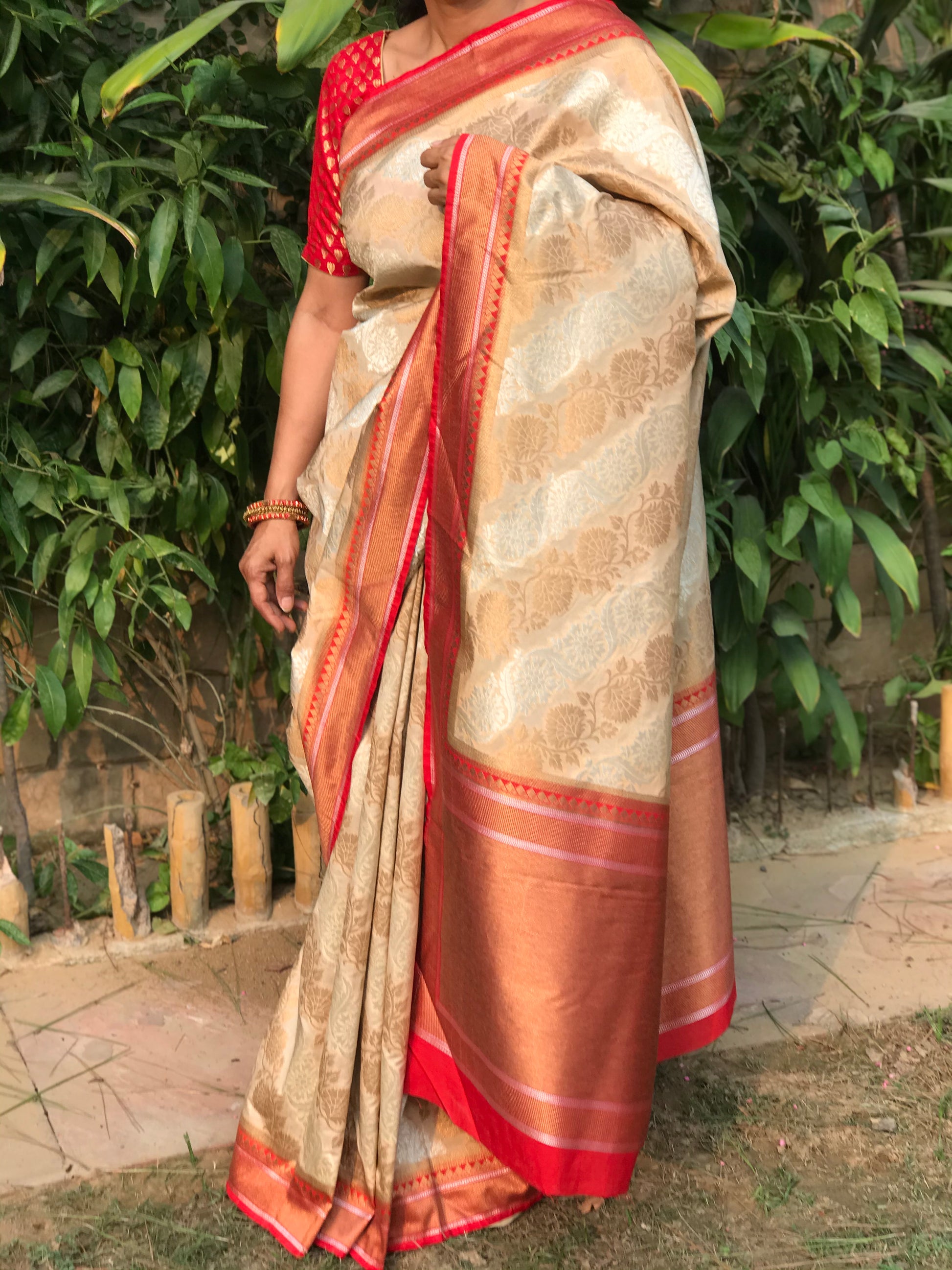 Image of Elegant and Traditional Pure Banarsee Silk Saree.  The Source India is an Indian Handicraft, Home Decor, Furnishing and Textiles Store. Based out of Hauz Khas Village New Delhi, each piece is carefully procured to allow the enhancement of India's Culture. 