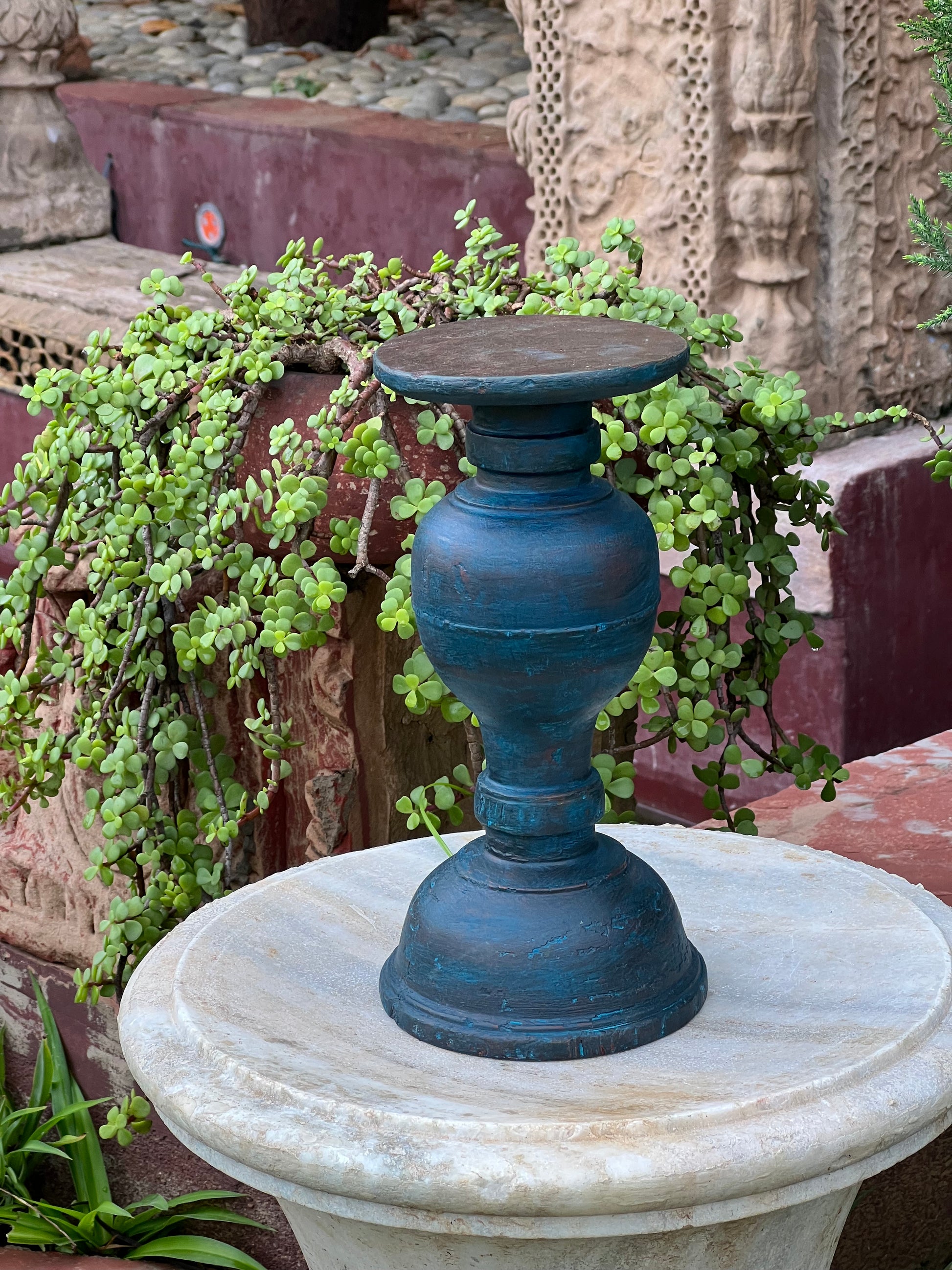 Image of Elegant and Traditional Wooden Stand Candle Holder.  The Source India is an Indian Handicraft, Home Decor, Furnishing and Textiles Store. Based out of Hauz Khas Village New Delhi, each piece is carefully procured to allow the enhancement of India's Culture. 