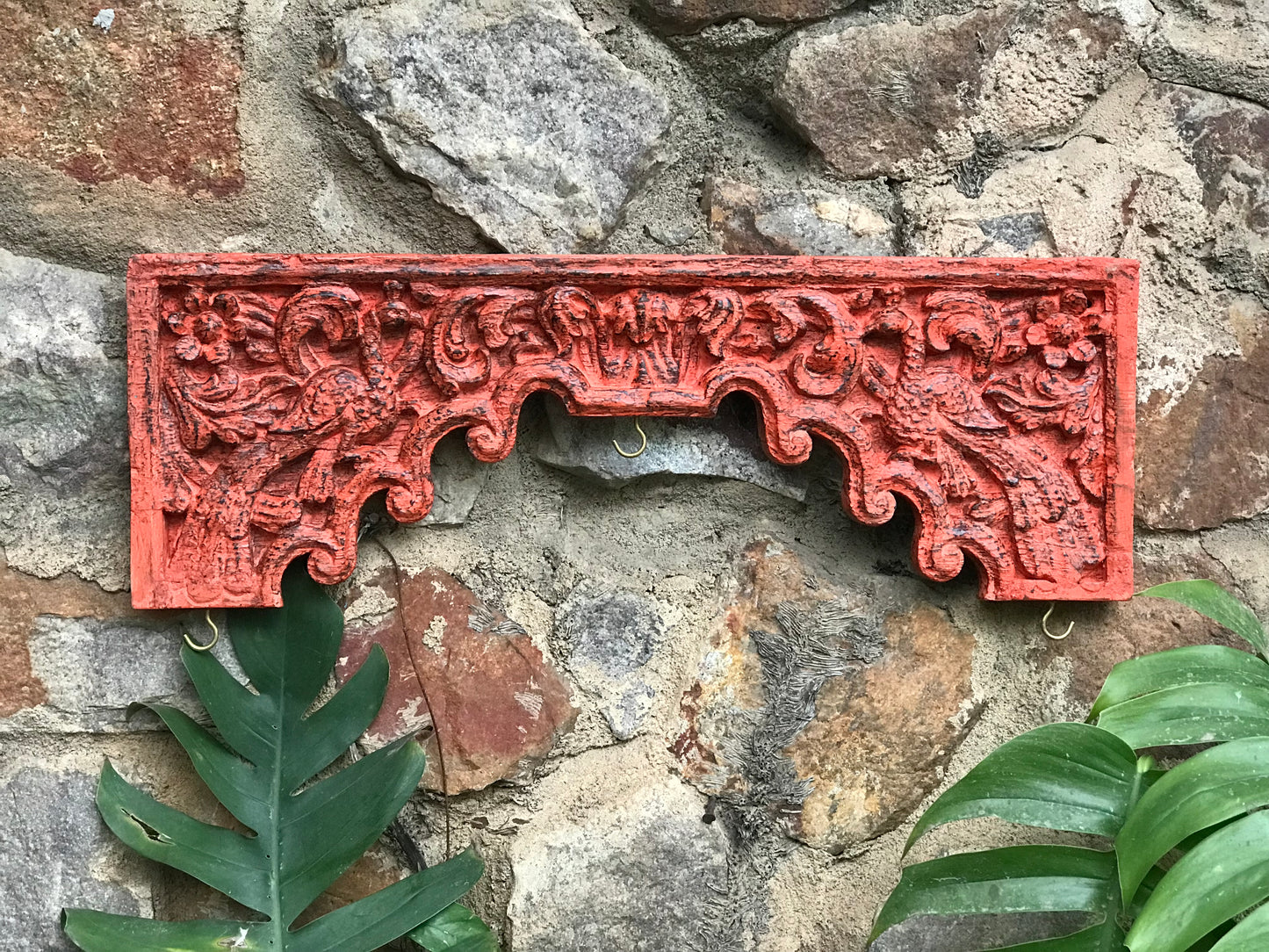 Image of Elegant and Traditional Orange Carved Panel with Hooks.  The Source India is an Indian Handicraft, Home Decor, Furnishing and Textiles Store. Based out of Hauz Khas Village New Delhi, each piece is carefully procured to allow the enhancement of India's Culture.